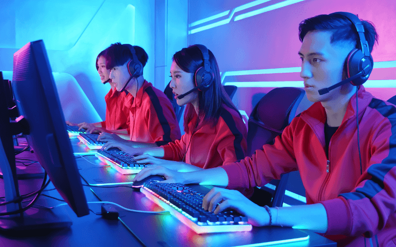 people in gaming competition looking at their computers